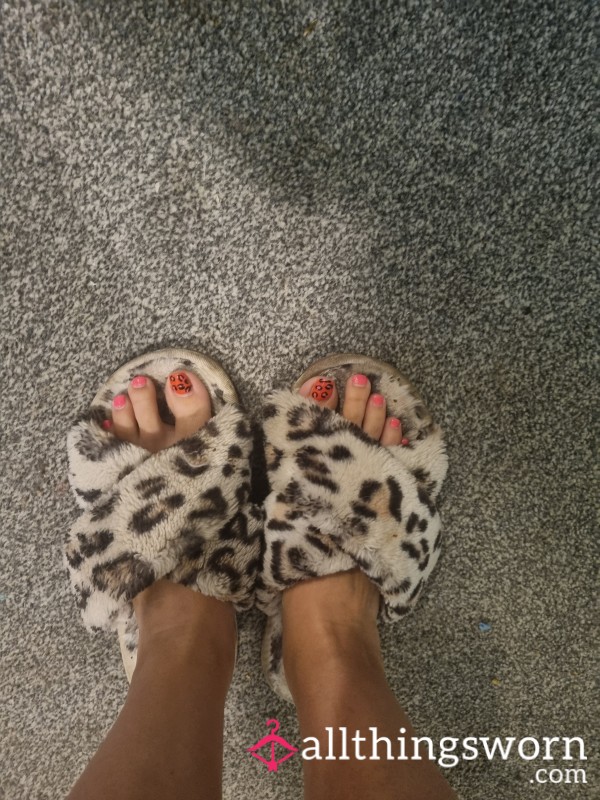 Very Worn Leopard Print Slippers