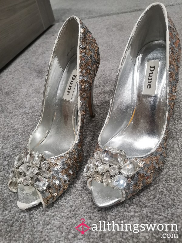 Very Worn Silver High Heels