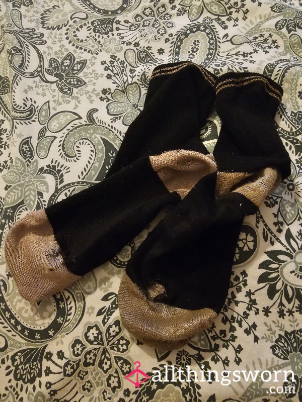 Very Worn, Smelly Socks With Thinning And Hole