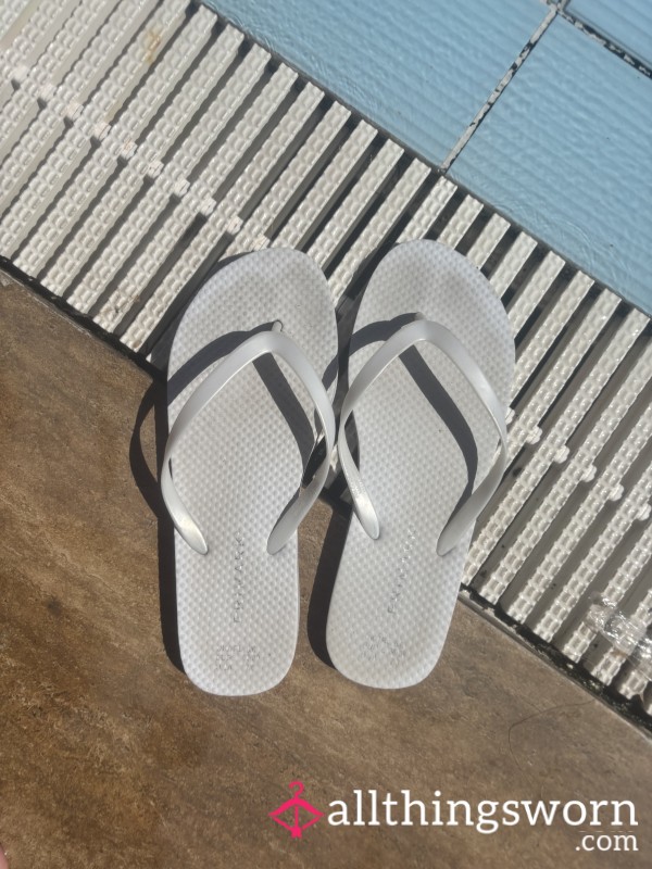 Very Worn, White Flip Flops