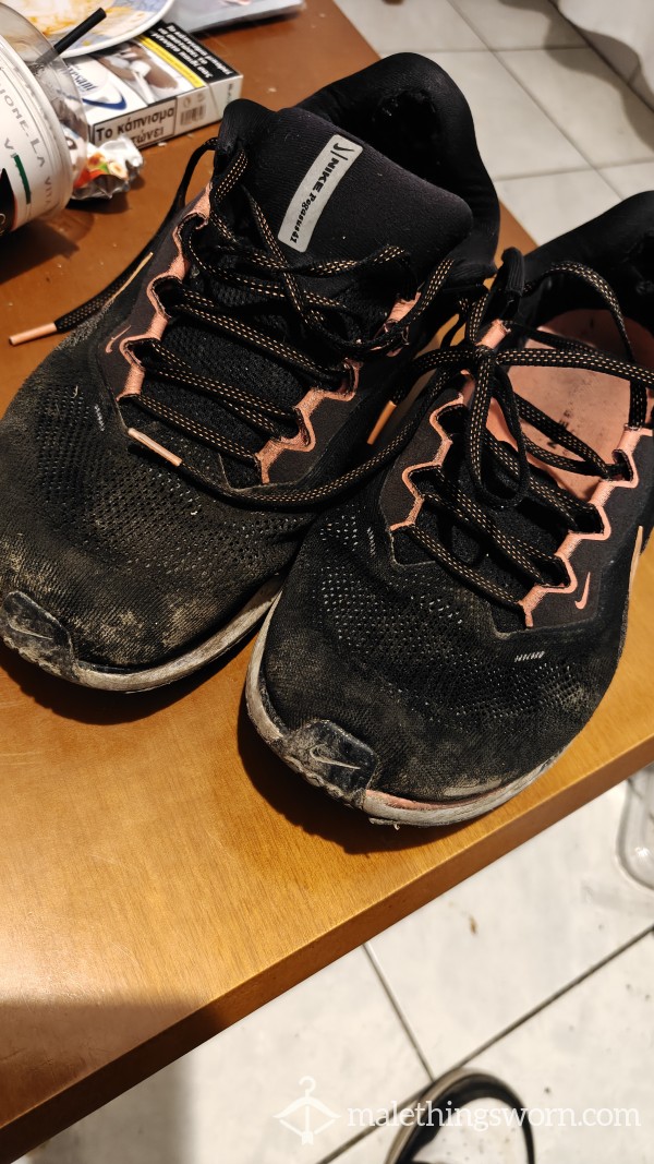 Waiter Worn Nike Pegasus Sneakers