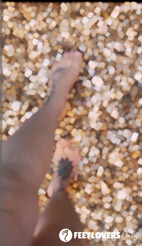 Walking Bare Foot Outside On Stones