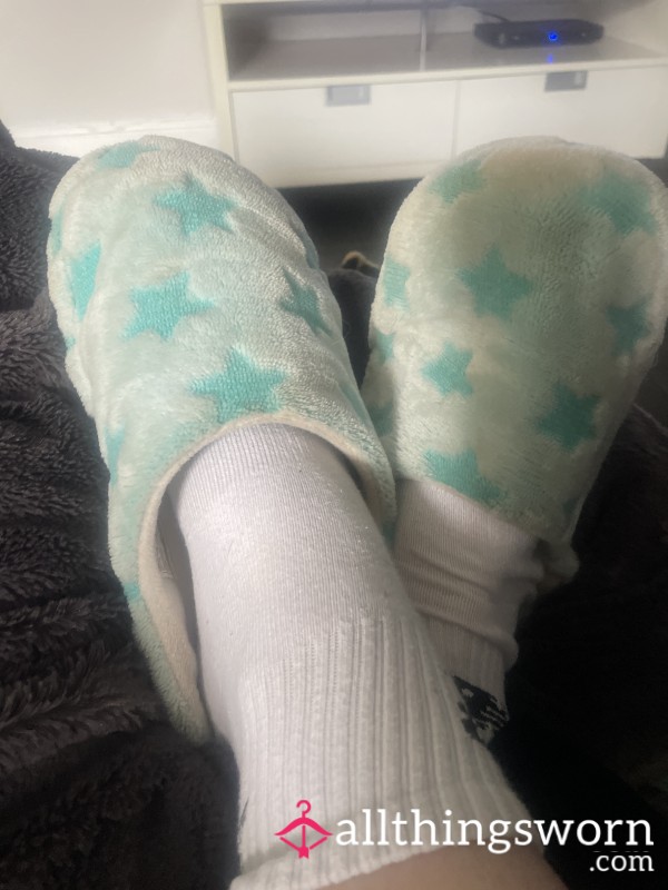 Well Used Blue Fluffy Slippers