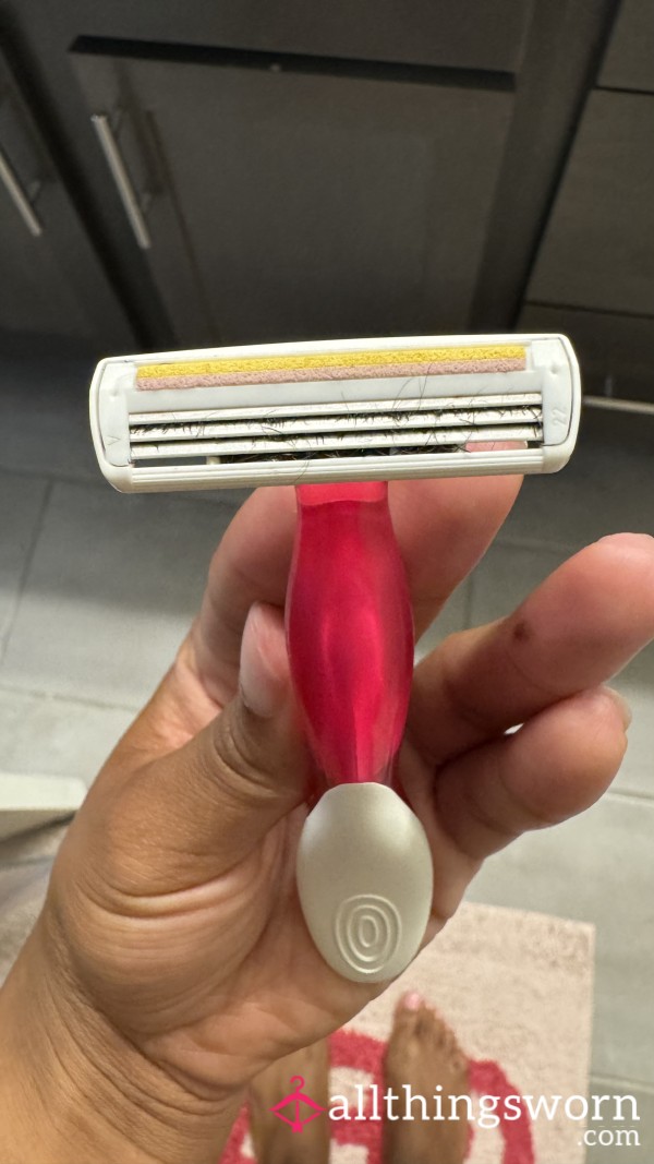 Well-Used Pink Razor - Intimate & Personal Touch