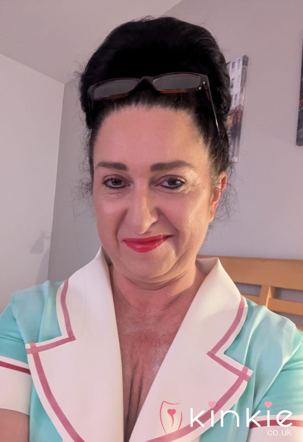 Well Used Rubber Nurse Outfit With Cap