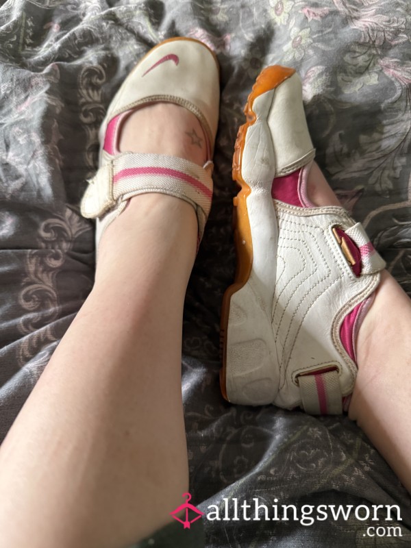 Well Worn 18 Year Old Nike Trainers