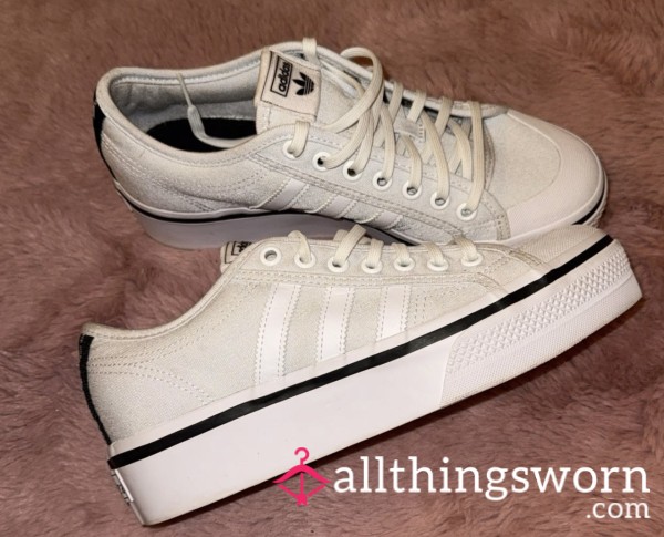 Well-worn Adidas Trainers