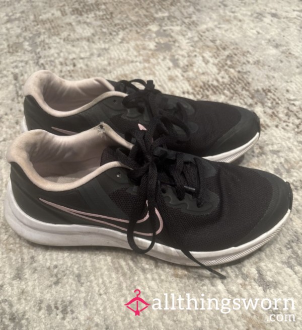 Well Worn And Used Nike Trainers