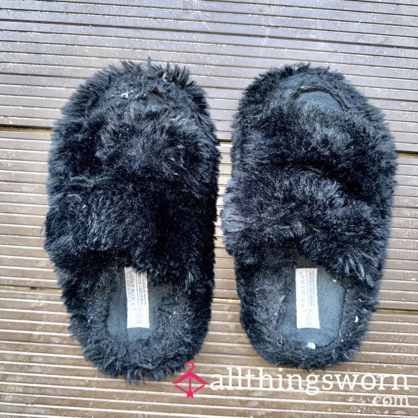 Well-Worn Black Fuzzy Slippers