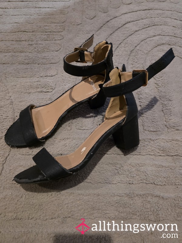 Well Worn Black Heels.