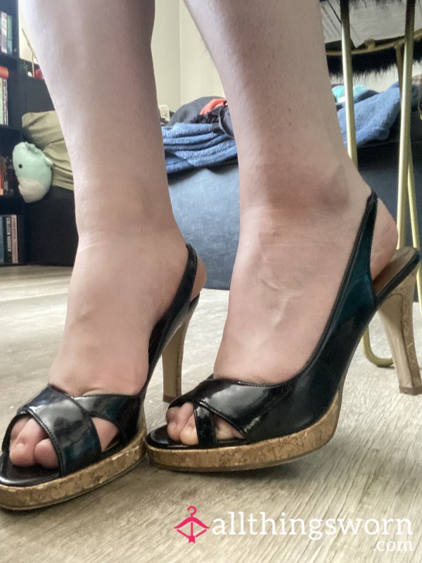Well-worn Black Heels With Cork Bottoms