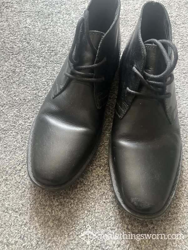 Well-Worn Black Leather Boots