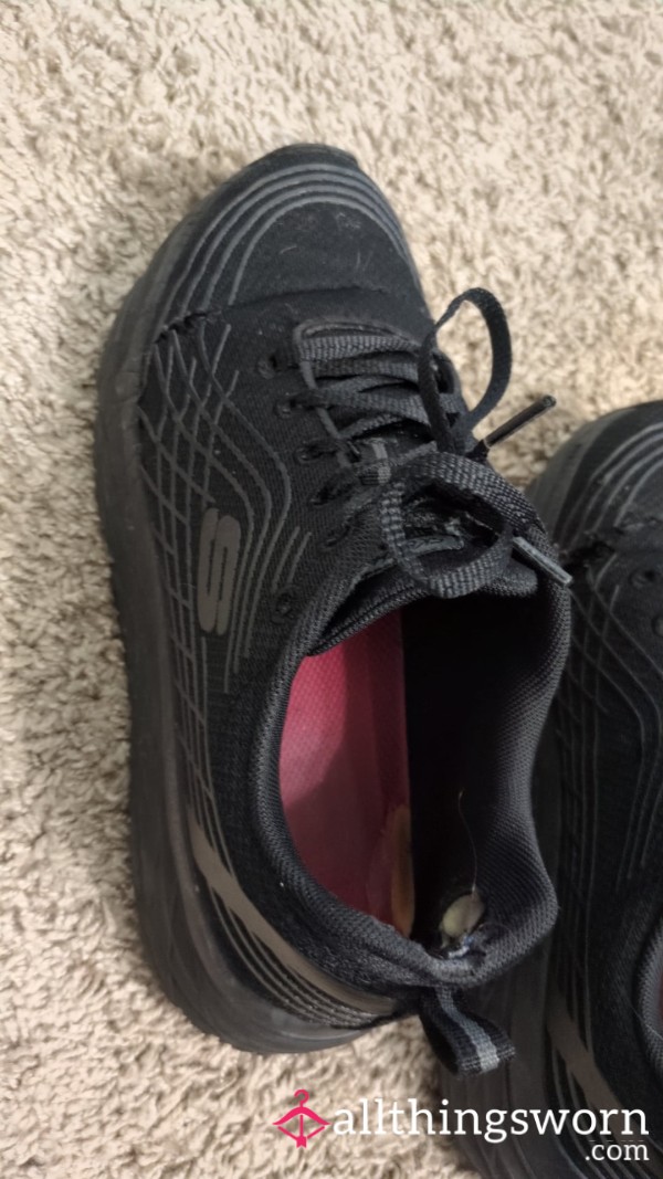 Well-worn Black Sketchers