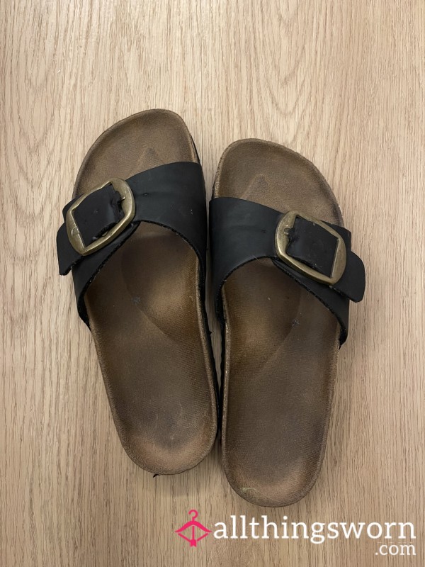 Well-worn Brown Slippers