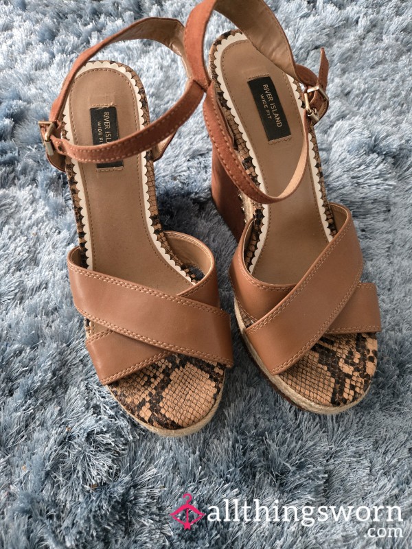 Well Worn Brown Wedge Heels