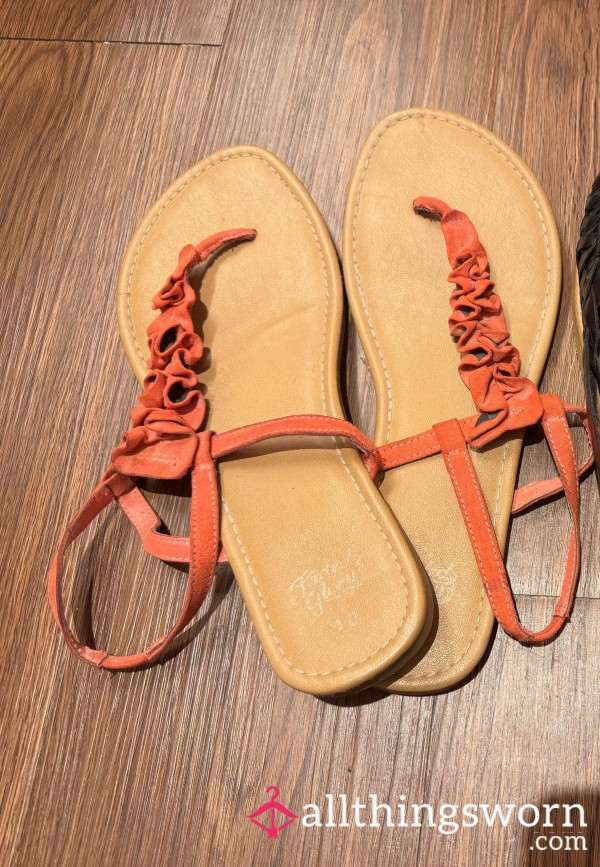 Well Worn Cor*l Flip Flops