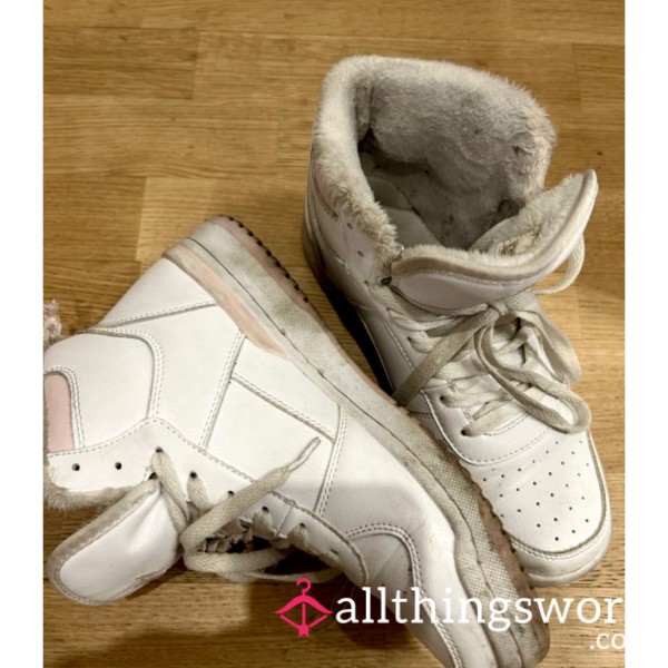 Well-worn Dirty Pair Of Sneakers