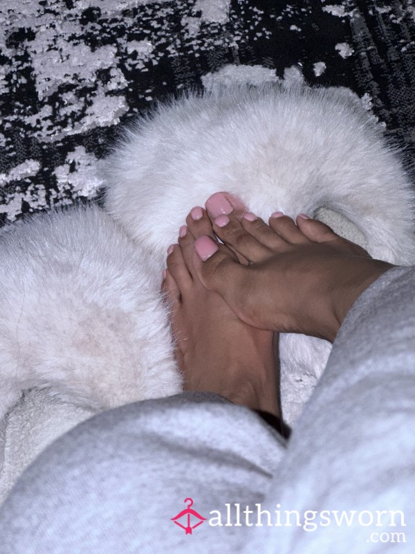 **Well Worn Fluffy Slippers**