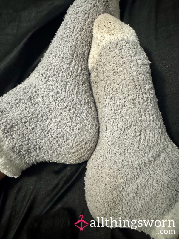Well Worn Fuzzy White And Gray Socks