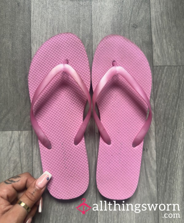Well Worn Pink Flip Flops