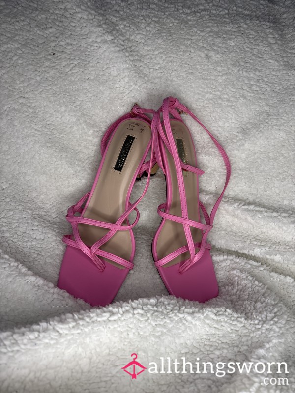 Well Worn Pink High Heels