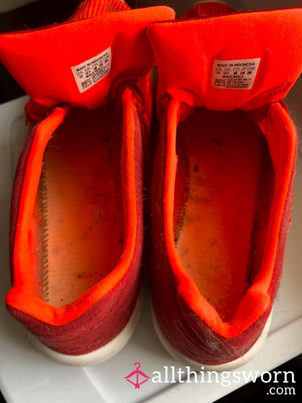 Well Worn Red Sneakers