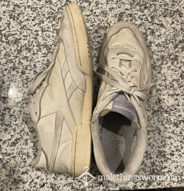 Well-worn Reebok C85s
