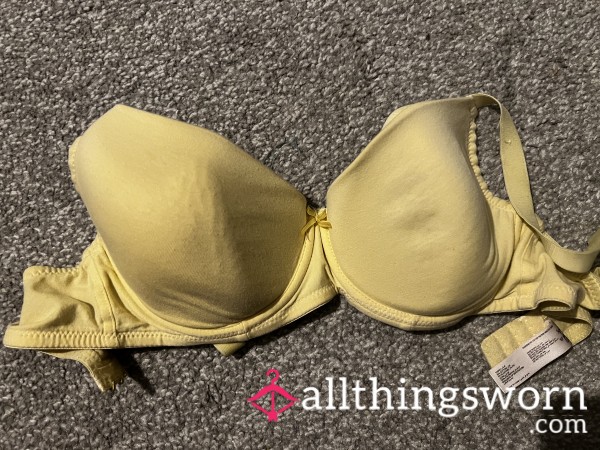 Well Worn Used Yellow Bra