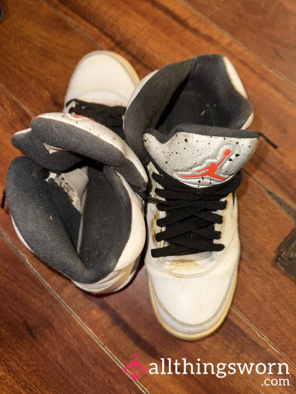 Well-Worn White Jordan Sneakers