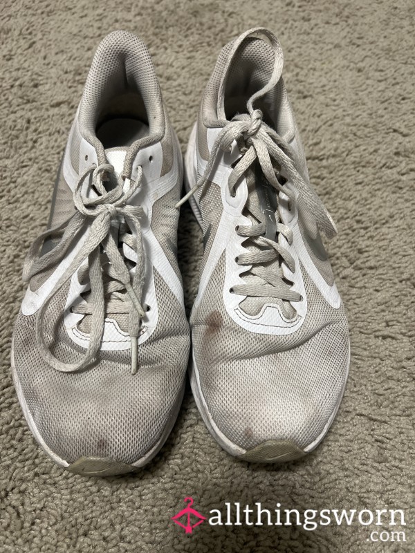 Well Worn White Nike Sneakers