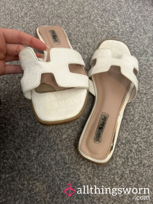 Well Worn White Sandals