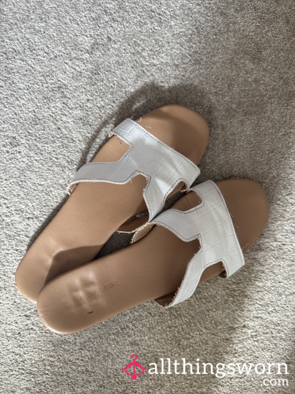 Well Worn White Sandals