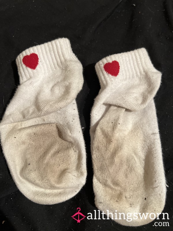 Well Worn White Socks With Little Red Heart