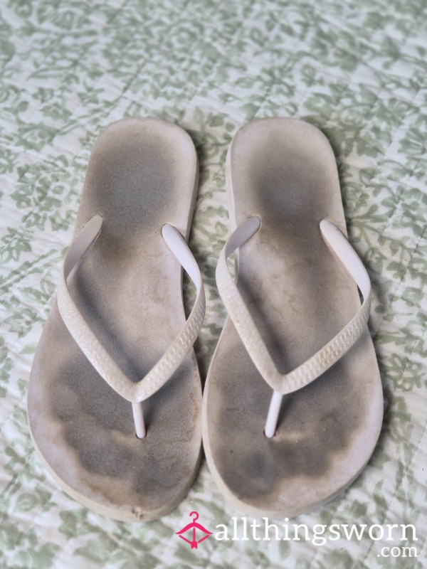 Well Worn White Thong Flip Flops