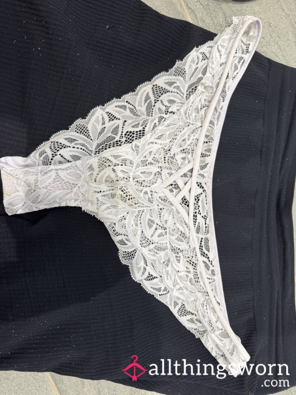 Well- Worn White Thongs