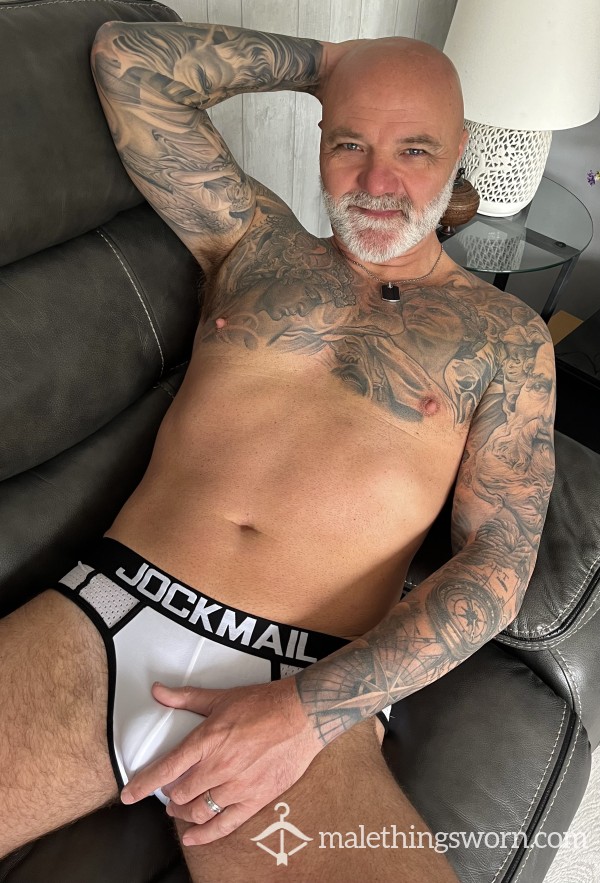White JOCKMAIL BRIEFS WITH BLACK TRIM. UK POSTAGE INCLUDED IN PRICE.