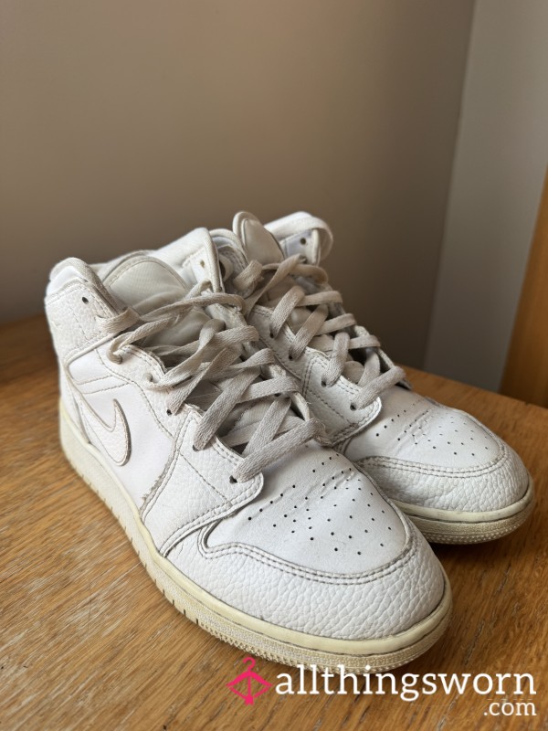 White Nike Jordan 1s