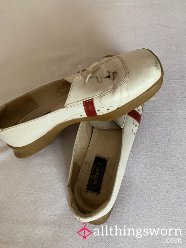White / Red Worn Shoes