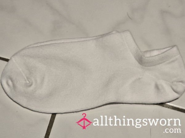 White Socks Worn By Small Feet