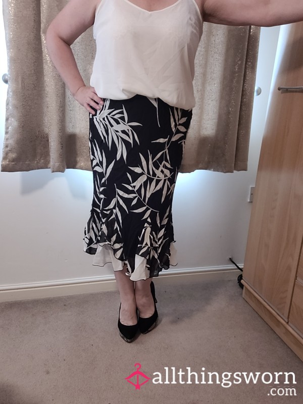 White Vest And Float Skirt