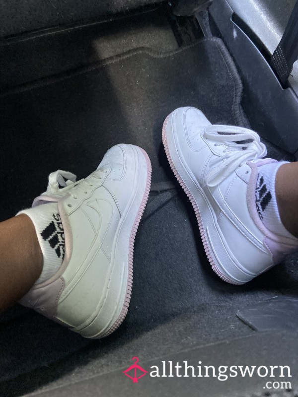 Worn Nike Air Forces Trainers