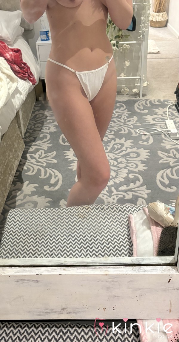 Worn And Played In White Thong
