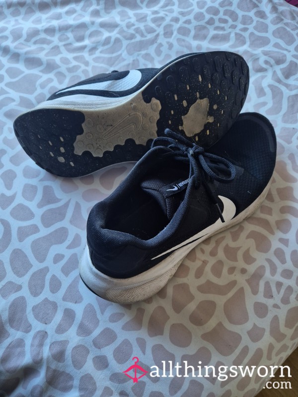 Worn, Battered Old Nike Trainers