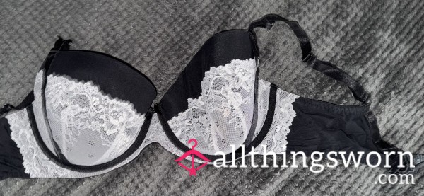Worn Black And Lace Bra