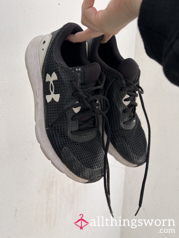 Worn Black And White Trainers