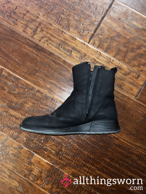 Worn Black Ankle Boots With Heavy Real Life Wear