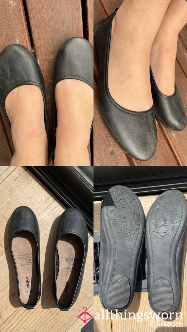 Worn Black Ballet Flat Shoes