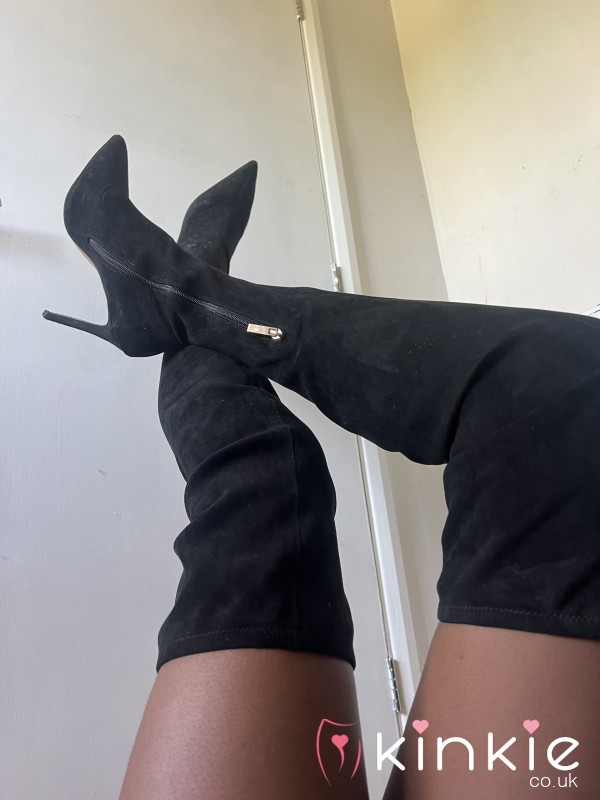 Worn Black Boots