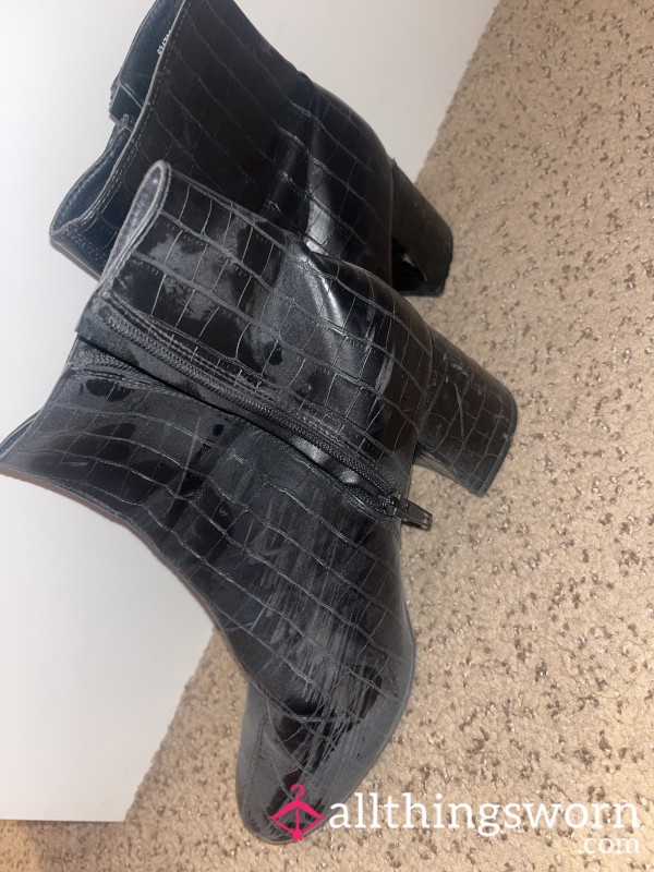 Worn Black Boots