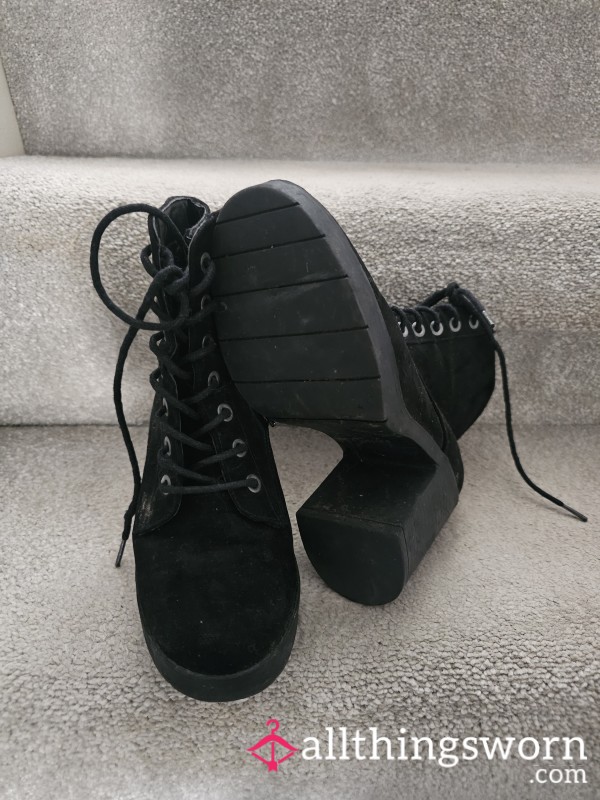 Worn Black Boots